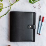 Black, animal-free cover with button for the reusable Asoki Planner