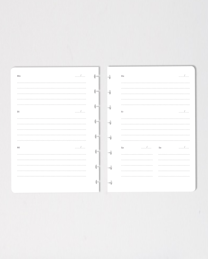 Set of erasable calendar notebook pages on grey background