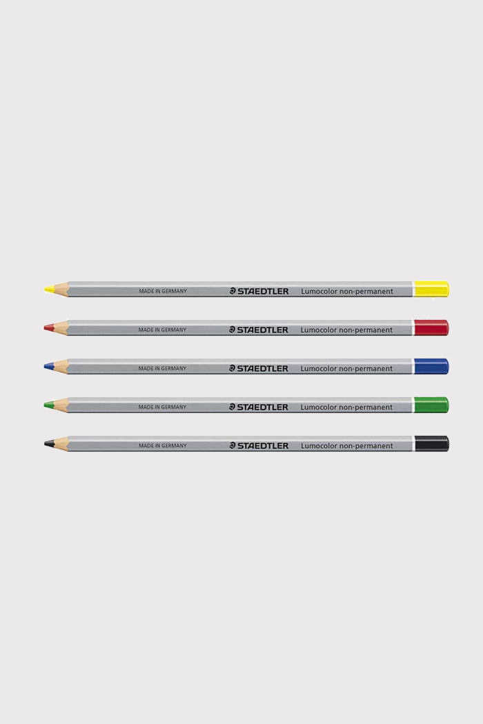 Five wooden grey pencils writing in the colours yellow, red, blue, green and black